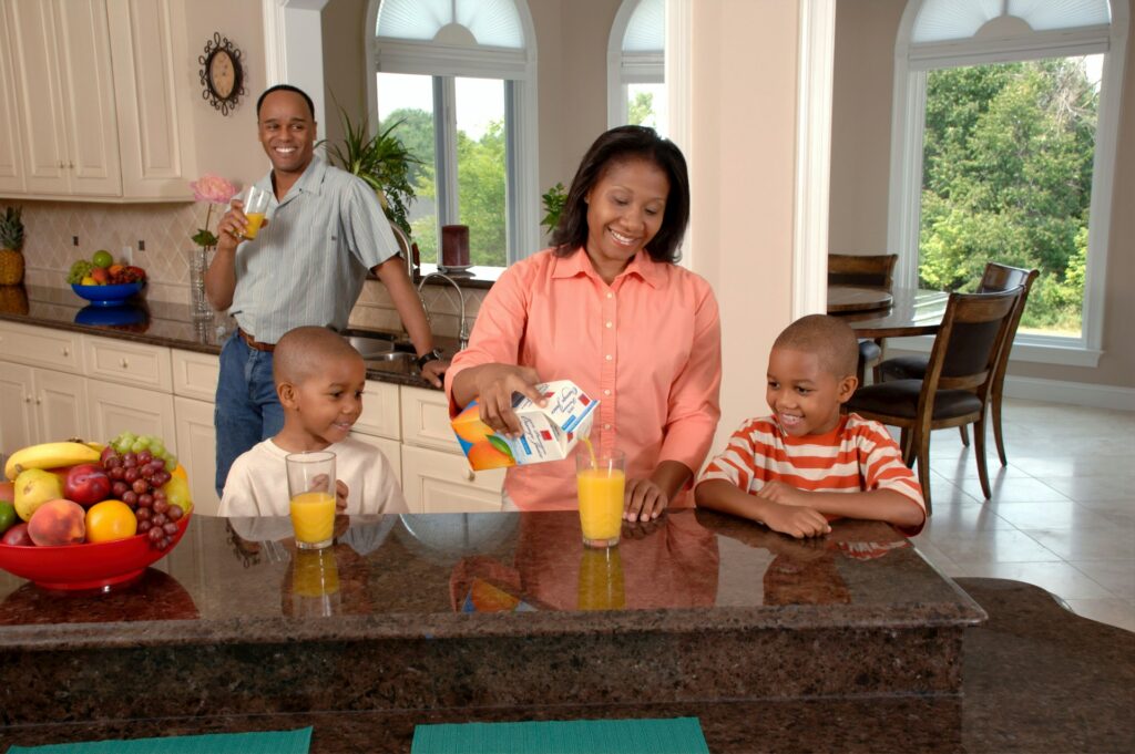 Family eating and drinking healthily together