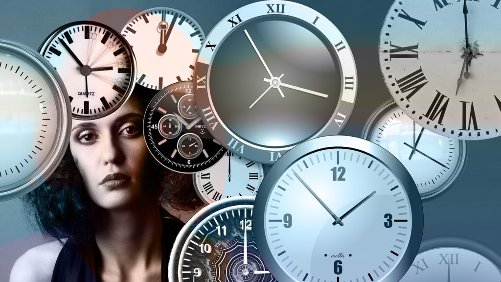 Woman with clocks - what are past experiences?