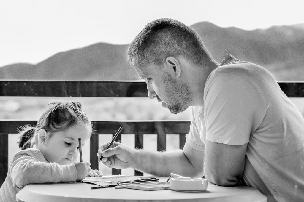 man helping daughter - helping good family relationships