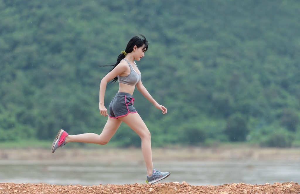 Girl running during the day to help her get sleep at night