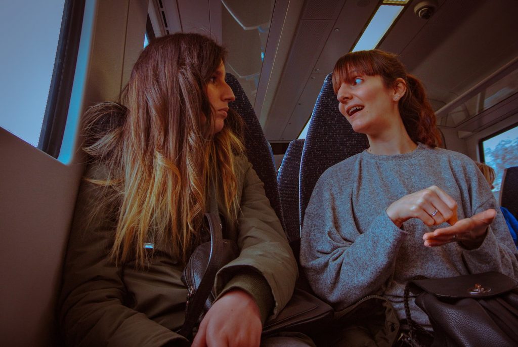 2 women in a family feud on a train
