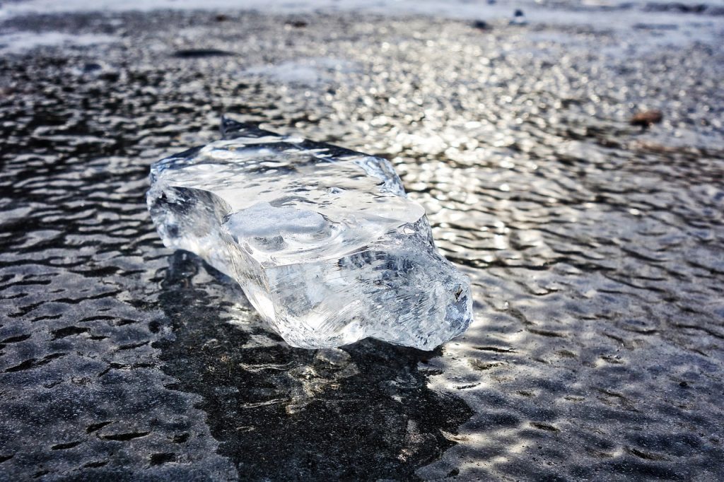 ice cube in cold water