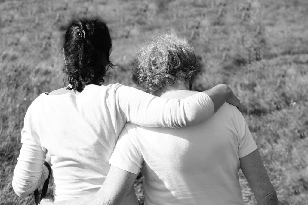 two people hugging showing why it is important to treat others with respect