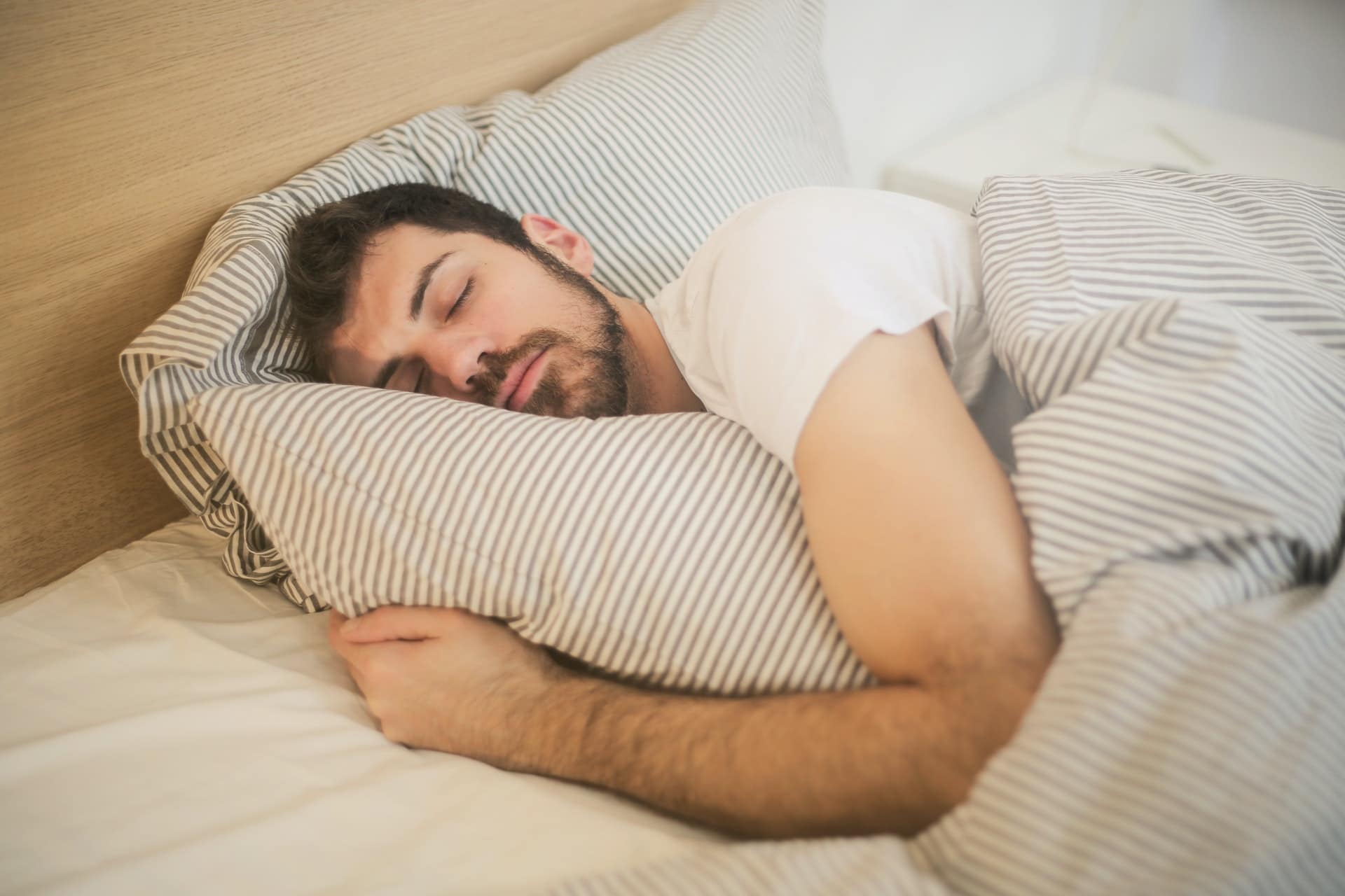 Man sleeping - How to improve your circadian rhythm