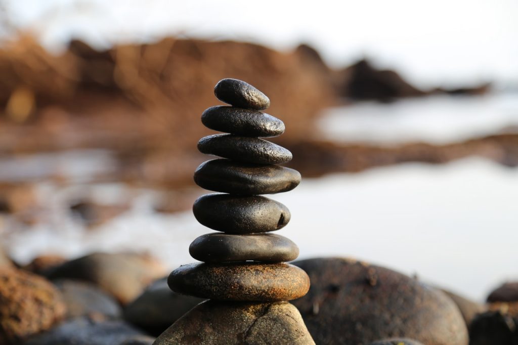 stacked pile of pebbles - Concepts and teachings to help find inner peace - how to find inner peace