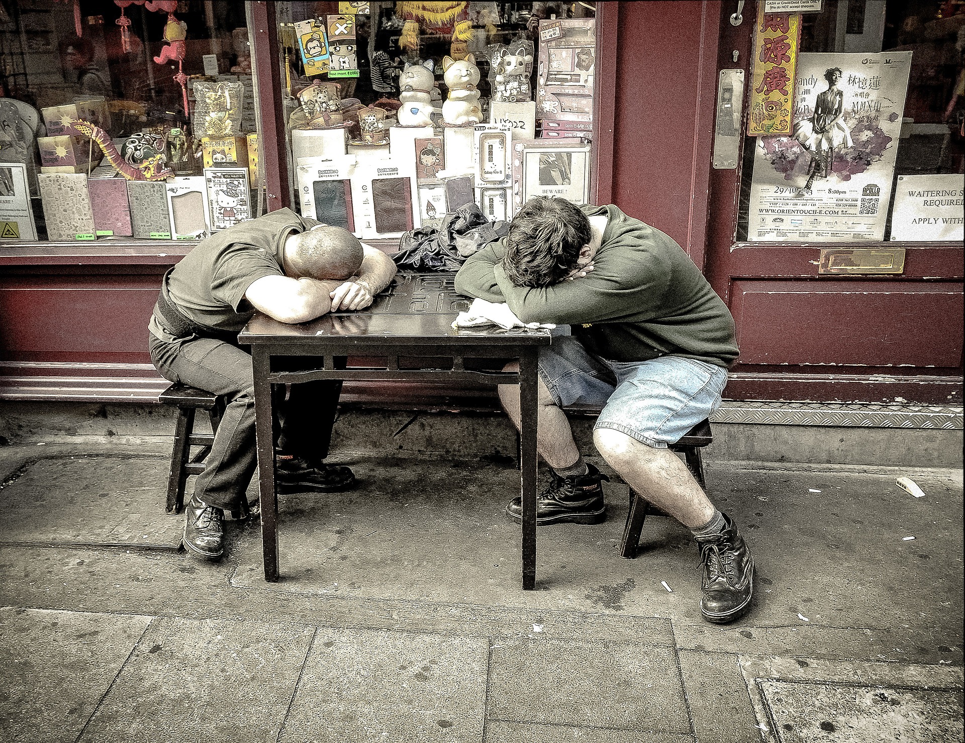 Two men lying on a table - how to take great naps