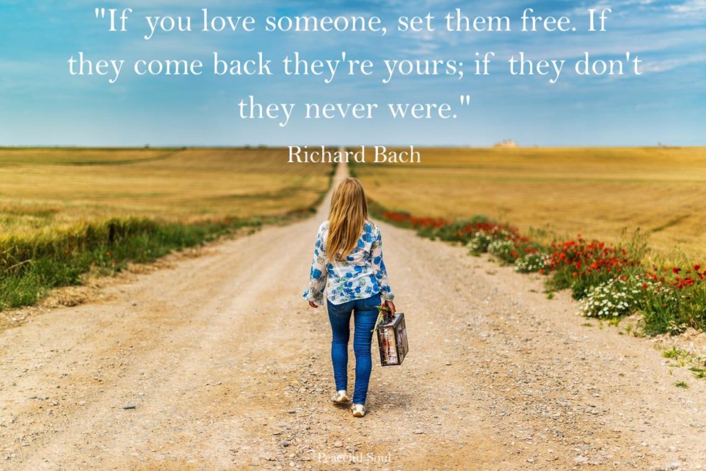 Woman walking away down a road with a suitcase - If you love someone, set them free. If they come back they're yours; if they don't they never were. Richard Bach - relationship quotes - quotes about love