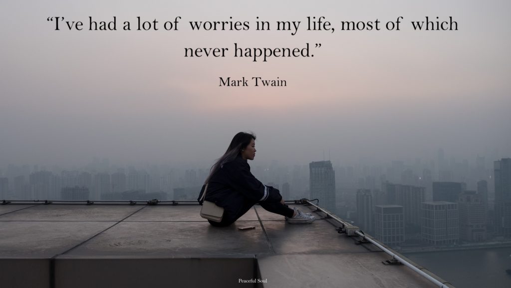 woman sat looking and thinking - “I’ve had a lot of worries in my life, most of which never happened.” Mark Twain - Quotes from the mental wellbeing 5 interviews - quotes about the mind