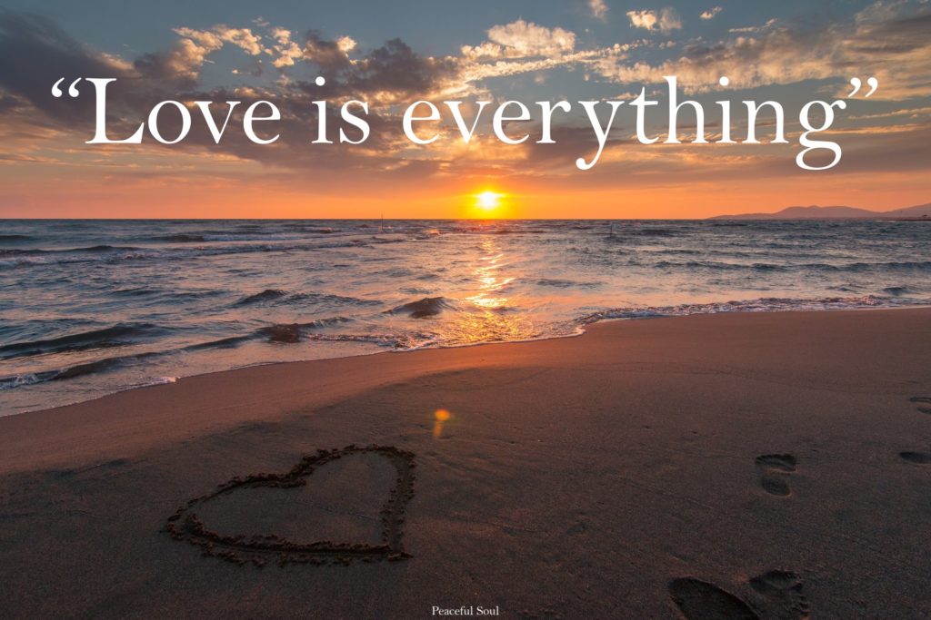Heart drawn on the beach with the sunset in the background - Love is everything - quotes about love
