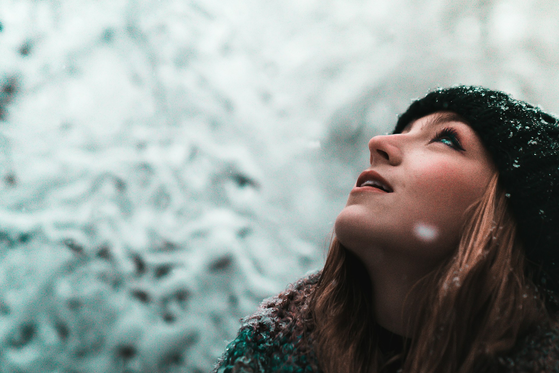 Woman looking happy in the snow